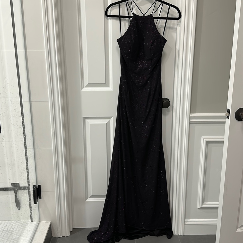 Never worn. Black with purple sparkle prom dress. Perfect condition